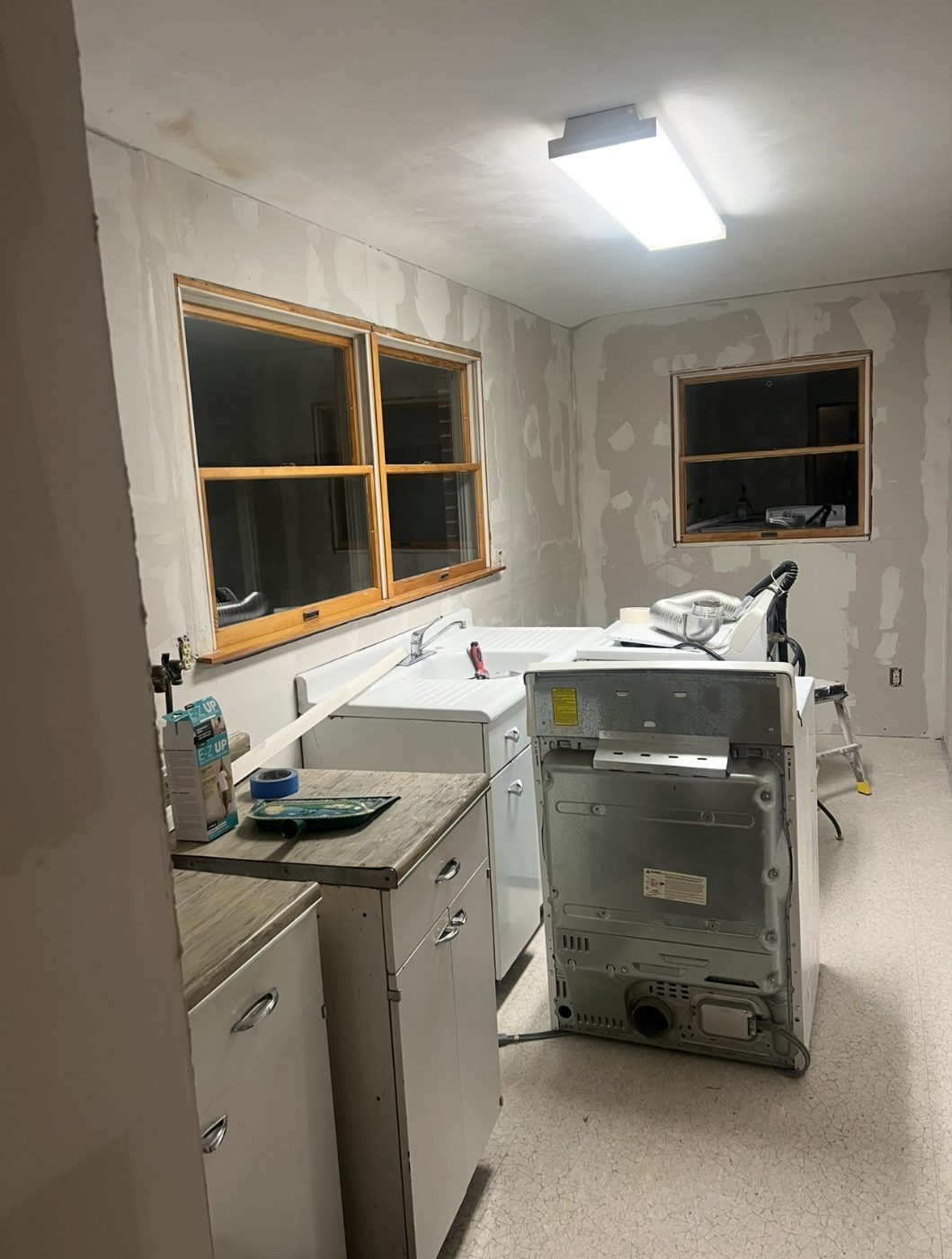 Laundry room walls stripped and refinished with drywall compound